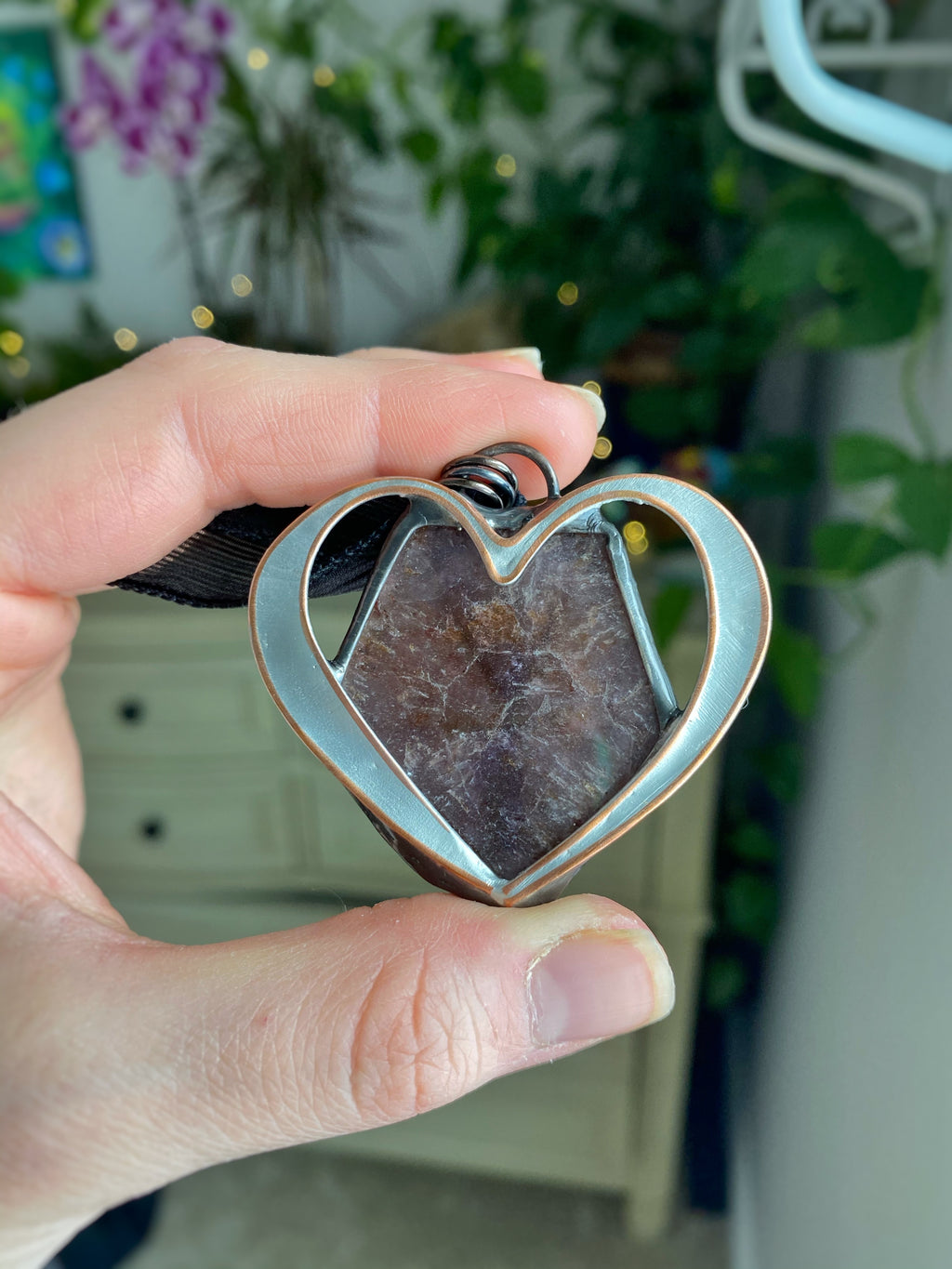 Cacoxenite in amethyst heart necklace